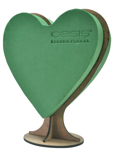 Mecánico en forma de corazón con espuma floral OASIS®, ideal para San Valentín, Día de la Madre y aniversarios. Base de MDF pintable o cubrible con follaje. Disponible en piezas individuales y cajas con 4 piezas. Dimensiones: 12.5" de alto x 10.12" de ancho.