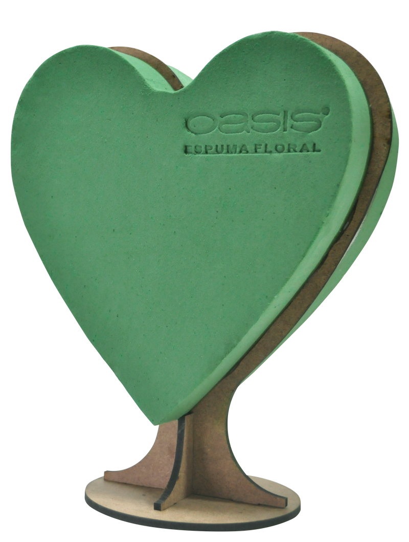 Mecánico en forma de corazón con espuma floral OASIS®, ideal para San Valentín, Día de la Madre y aniversarios. Base de MDF pintable o cubrible con follaje. Disponible en piezas individuales y cajas con 4 piezas. Dimensiones: 12.5" de alto x 10.12" de ancho.